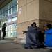 Customers T'ontaye Jones, 14, and Jesse Morris, 15, wait in line for Black Friday deals outside Best Buy late Wednesday night. They were the first in line at 2:00 p.m. Best Buy will open Thursday at midnight. Daniel Brenner I AnnArbor.com